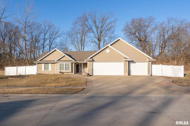 view of front of house with a garage and a front lawn