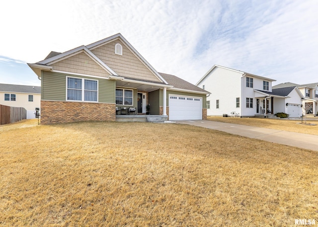 craftsman-style house featuring a garage and a front yard