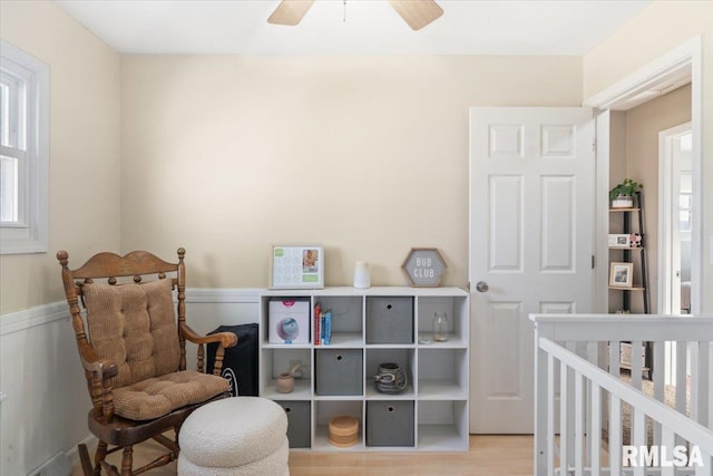 bedroom featuring ceiling fan and light wood-type flooring