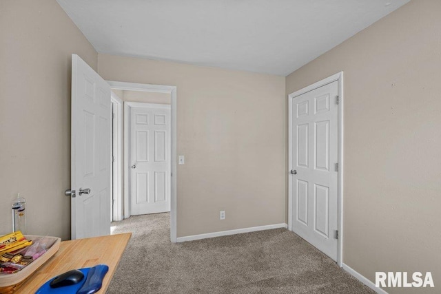 unfurnished bedroom with carpet floors