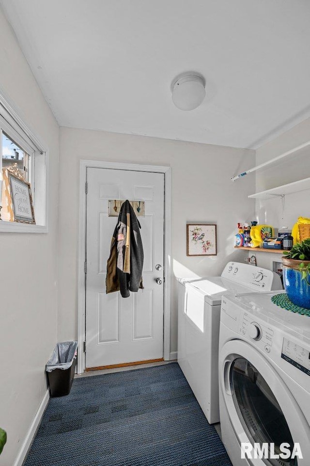 washroom featuring dark carpet and washer and dryer