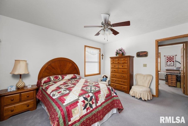 carpeted bedroom with ceiling fan