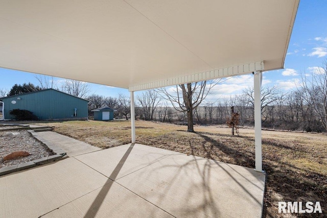 view of patio featuring a storage unit