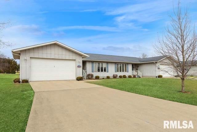 single story home with a garage and a front lawn