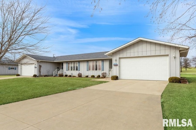 single story home featuring a garage and a front yard