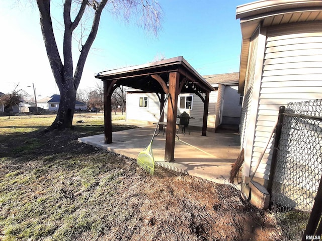 view of yard with a gazebo and a patio area