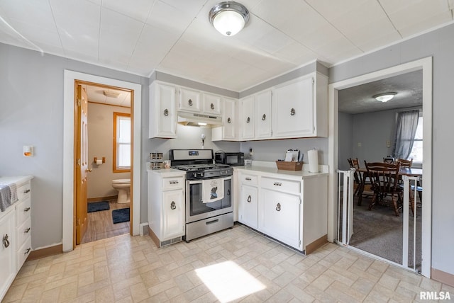 kitchen with white cabinetry and stainless steel gas range