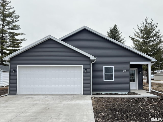 single story home featuring a garage