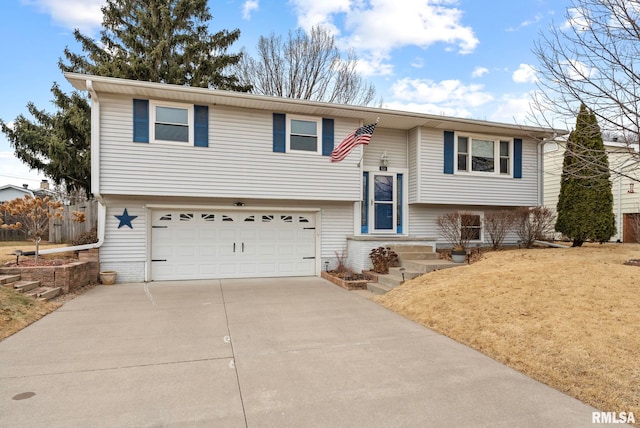 split foyer home featuring a garage