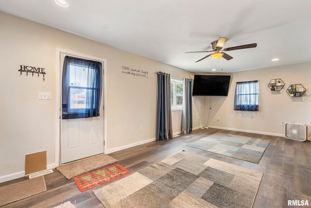 foyer featuring a ceiling fan, recessed lighting, baseboards, and wood finished floors