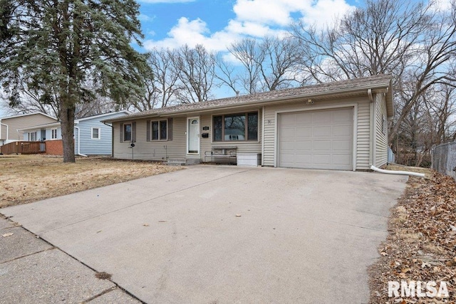 ranch-style home with a garage