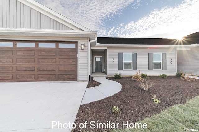 view of front of property featuring a garage