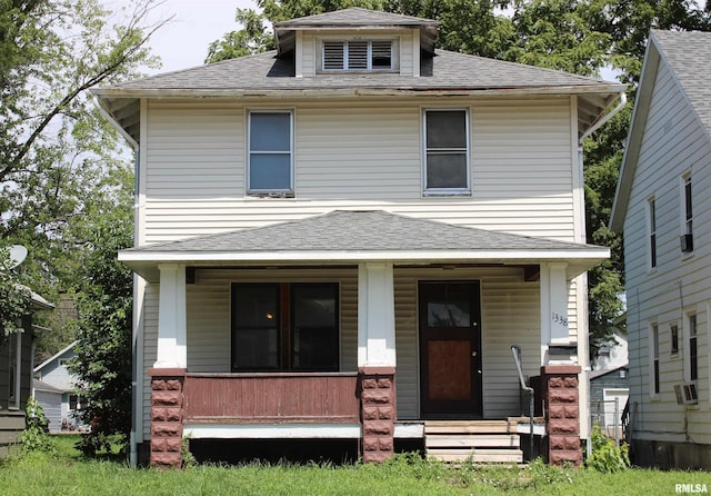 view of front of property featuring covered porch