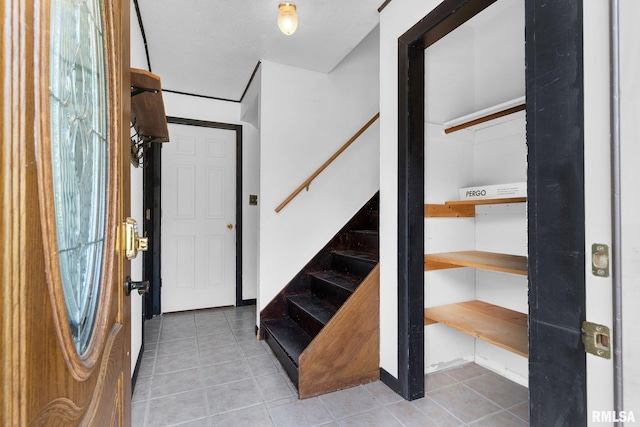 view of tiled foyer entrance