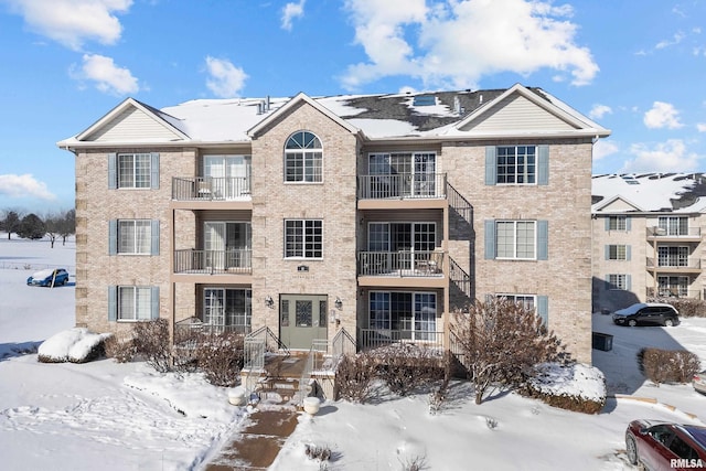 view of snow covered property