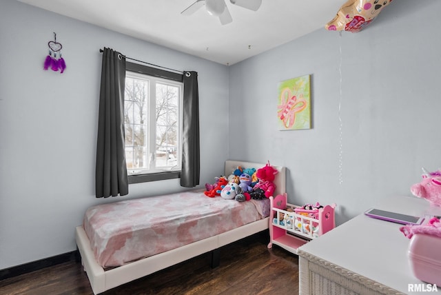 bedroom featuring dark wood-type flooring and ceiling fan