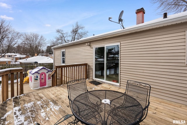 view of snow covered deck