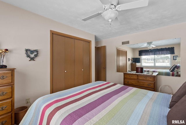 bedroom featuring a closet and ceiling fan