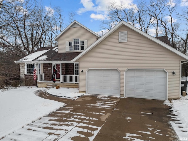 view of front of house with a garage and a porch