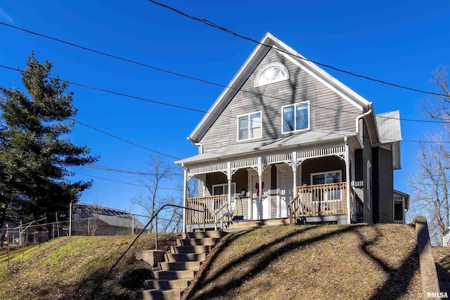 view of front of property featuring covered porch