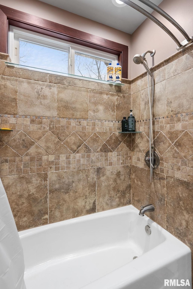 bathroom with shower / bathtub combination with curtain