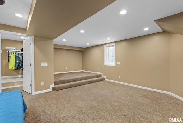 basement featuring carpet flooring