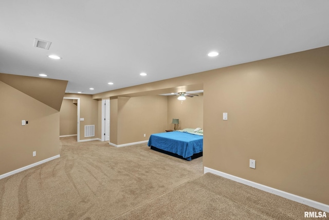 unfurnished bedroom with light colored carpet