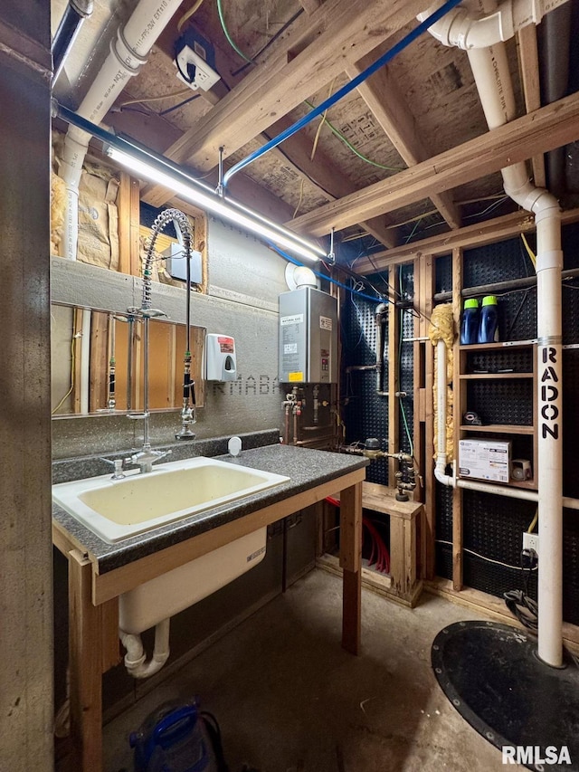 basement with sink and tankless water heater