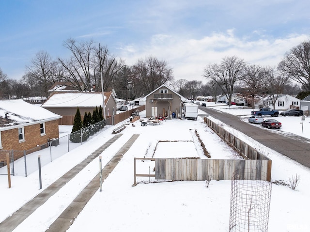 view of yard covered in snow