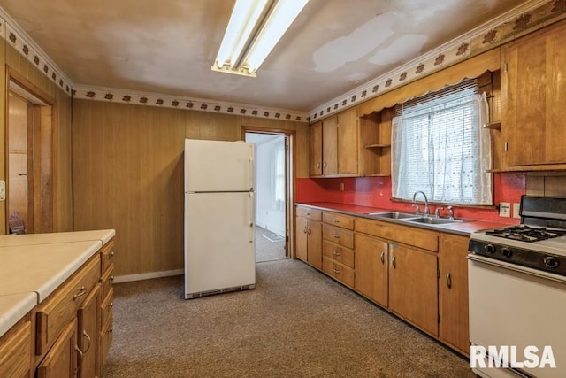 kitchen with sink and white appliances