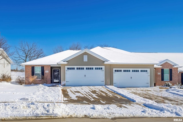 single story home featuring a garage