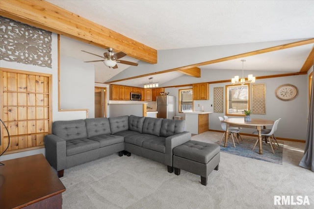 living room featuring light carpet, vaulted ceiling with beams, and ceiling fan with notable chandelier