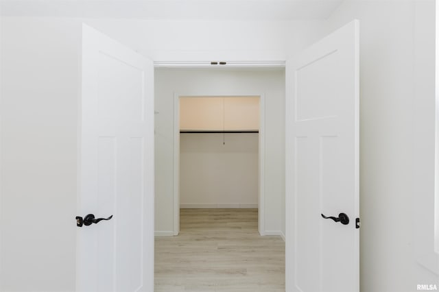 hall featuring light wood-style flooring