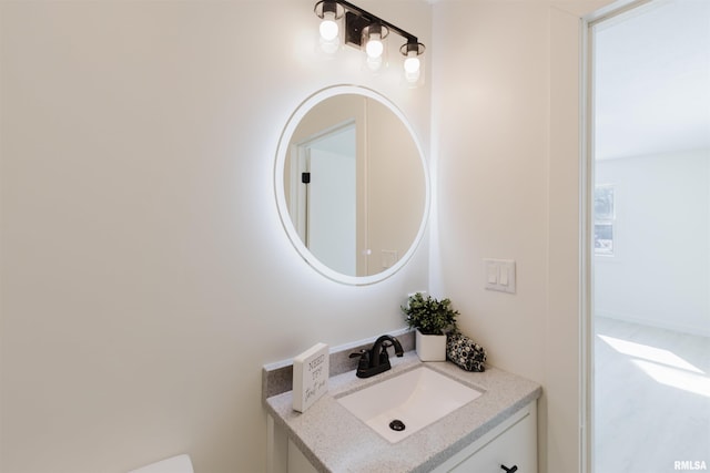 half bathroom with vanity