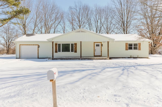 ranch-style home featuring an attached garage