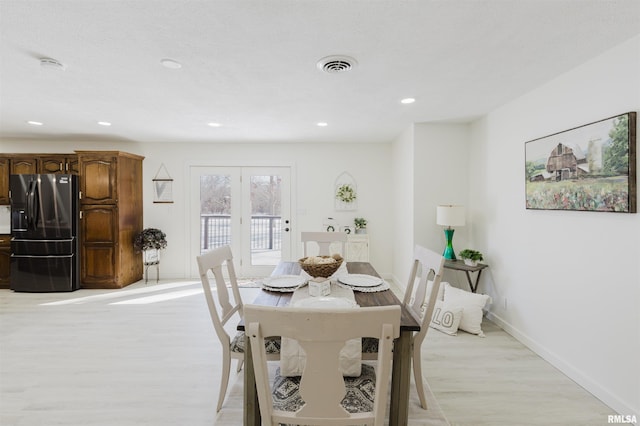 dining area with recessed lighting, visible vents, baseboards, french doors, and light wood-type flooring