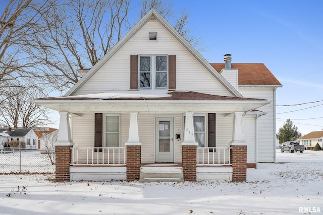 view of front of property featuring covered porch