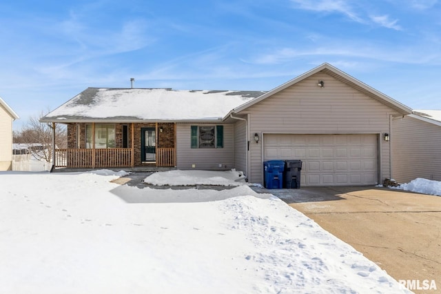 ranch-style home with a garage, covered porch, and concrete driveway