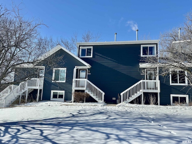 view of snow covered house