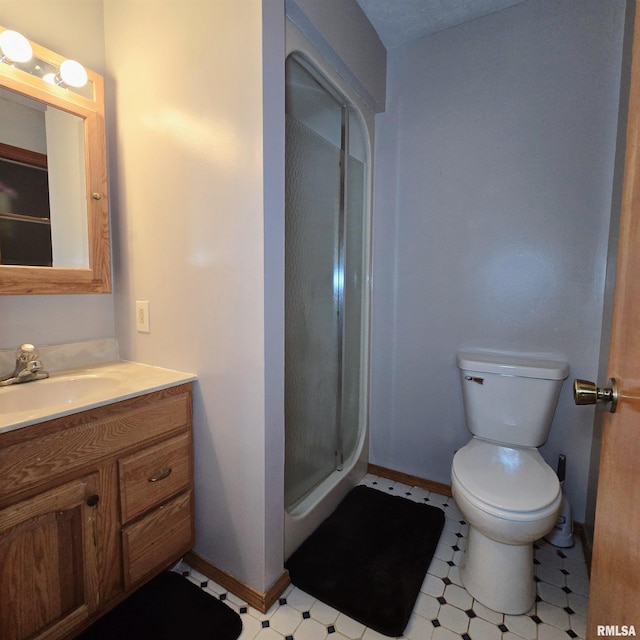 223 N King St, Hurst, IL 62949 - bathroom with baseboards, a shower stall, and toilet