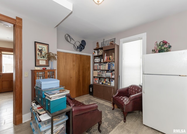 living area with wood finished floors