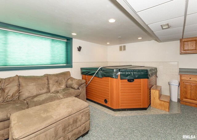 living area with visible vents and recessed lighting