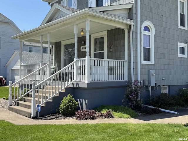 doorway to property featuring covered porch and crawl space