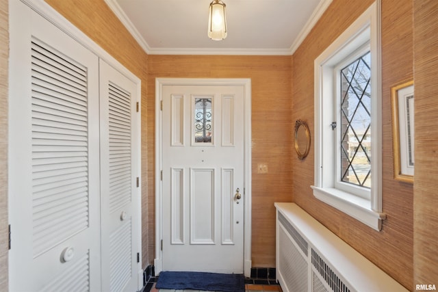 doorway with radiator heating unit and crown molding