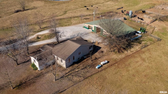 birds eye view of property featuring a rural view