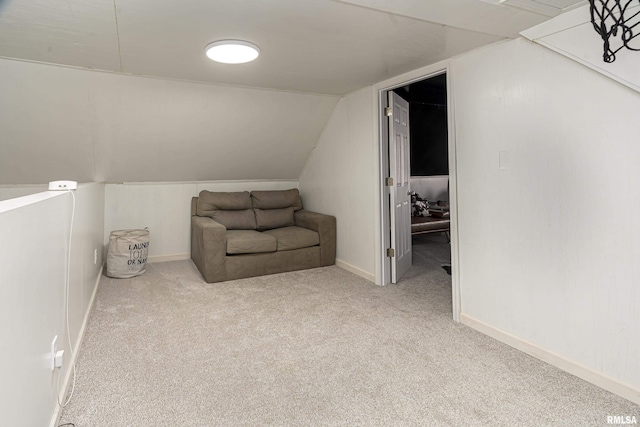 bonus room with light carpet, baseboards, and lofted ceiling