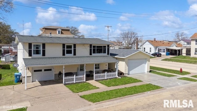 traditional style home with a garage, driveway, a residential view, and fence