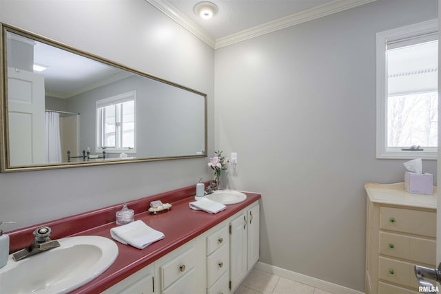 bathroom with double vanity, tile patterned flooring, crown molding, and a sink