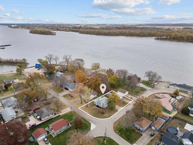 bird's eye view featuring a residential view and a water view