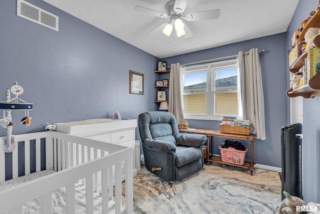 bedroom with visible vents, ceiling fan, and baseboards